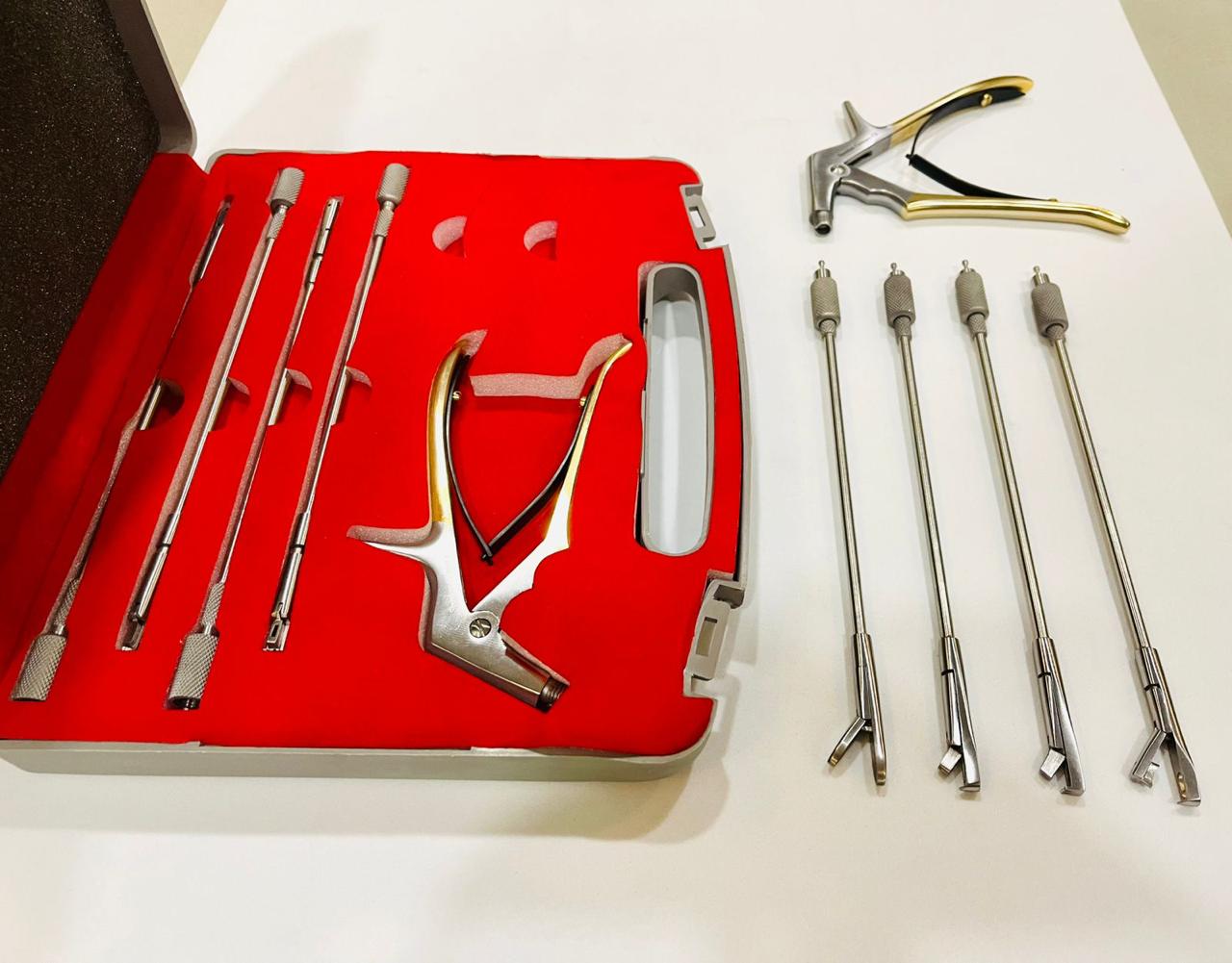 Pinza rotatoria con 4 puntas con estuche
